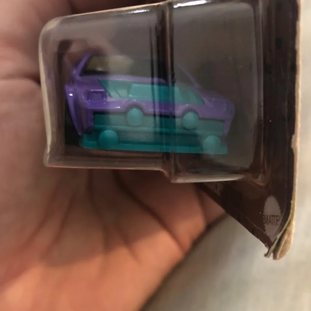 Mattel Hot Wheels Dimachinni Veloce Toy Car - Purple and Yellow